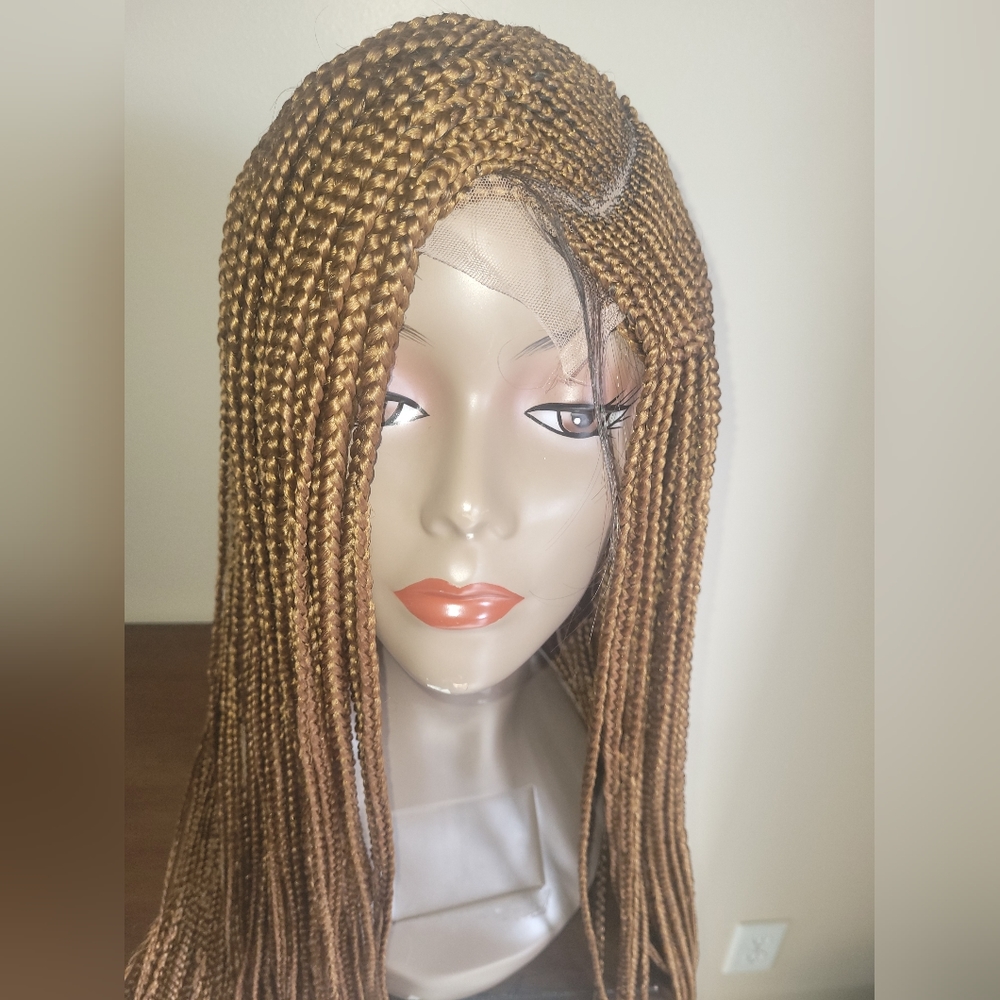 32", 5×5 closure braided unit medium honey blonde. NWOT.  Made in Africa.